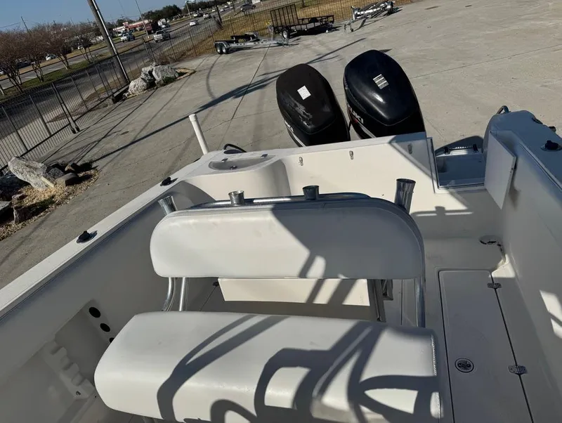 Slide: The Image of 2005 Sea Chaser 2600 CC boat interior with dual outboard motors. - 4