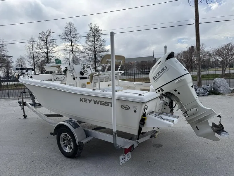 Slide: The Image of 2017 Key West 176cc boat with Suzuki outboard motor on trailer. - 4