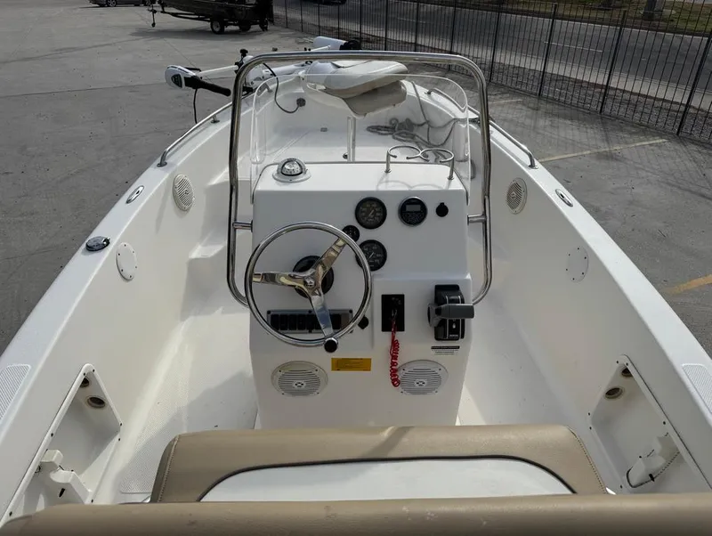 Slide: The Image of 2017 Key West 176cc boat interior with steering console and seating. - 8