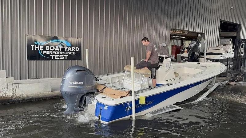 Slide: The Image of 2019 NauticStar 215 XTS boat undergoing performance test at The Boat Yard. - 15