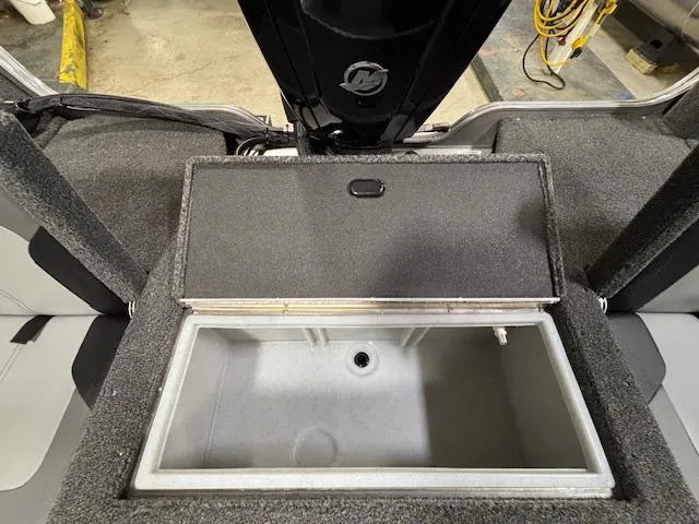 Slide: The Image of Open storage compartment in 2025 Crestliner 1650 Hawk boat, showcasing interior space. - 2
