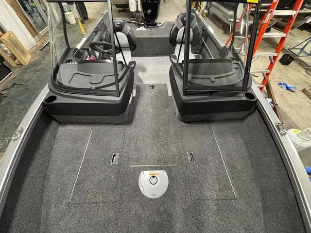 Slide: The Image of 2025 Crestliner 1650 Hawk interior, featuring spacious seating and modern design. - 7