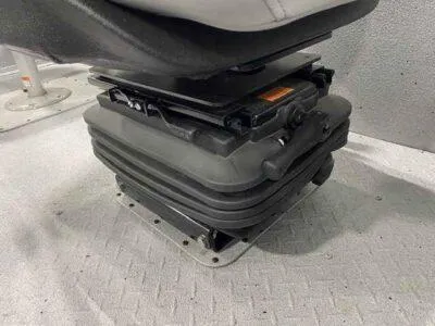 Slide: The Image of Seat base mechanism in a 2025 SeaArk EasyCat boat interior. - 15