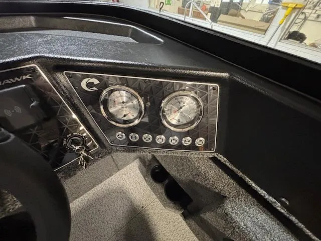 Slide: The Image of Dashboard of 2025 Crestliner 1750 Fish Hawk boat with gauges and controls. - 18