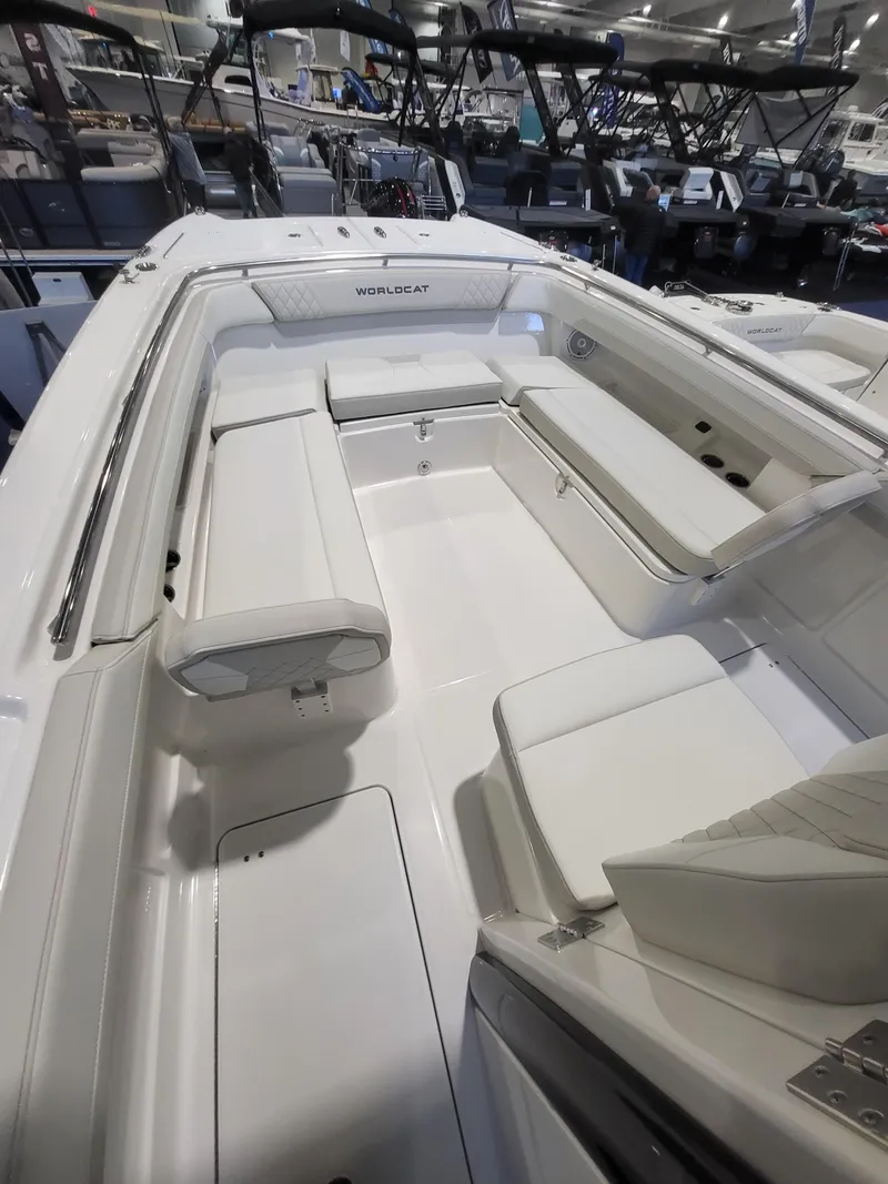 Slide: The Image of 2024 World Cat 280 CC-X boat interior with white seating and spacious layout. - 12
