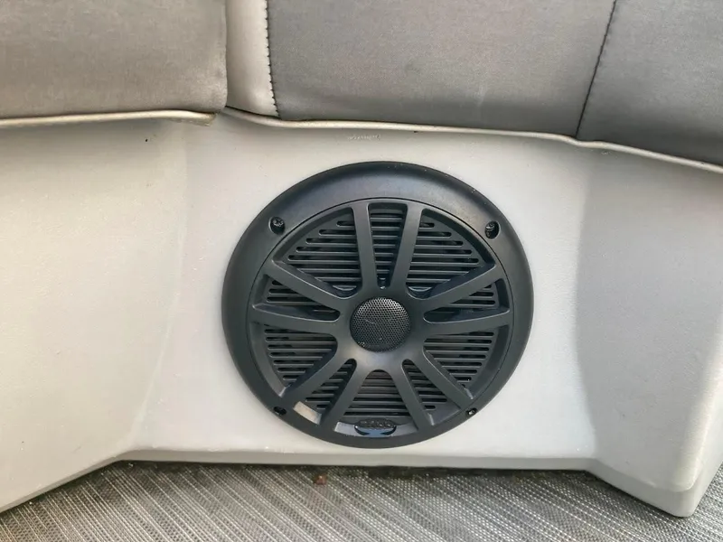 Slide: The Image of Boat speaker on a 2021 Bennington SX23 175HP MERCURY, gray interior. - 24