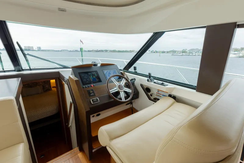 Slide: The Image of 2015 Tiara Yachts 44 Coupe- SILVER LINING- Helm - 9