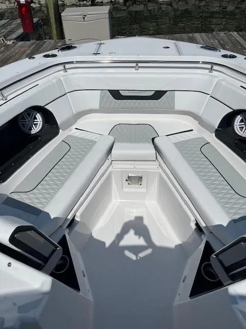 Slide: The Image of 2024 Blackfin 302 DC boat bathroom with sink and toilet, modern design. - 13