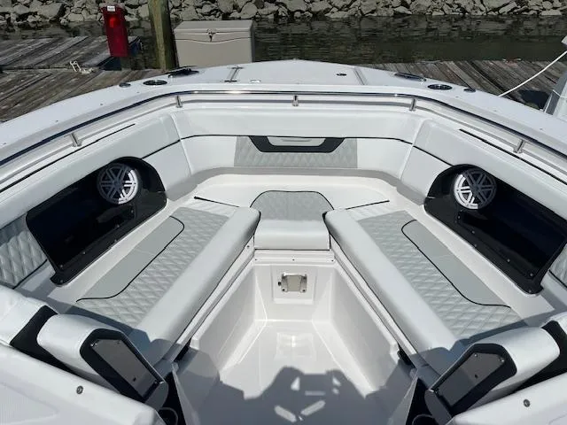 Slide: The Image of 2024 Blackfin 302 DC boat interior with luxurious seating and modern design. - 16