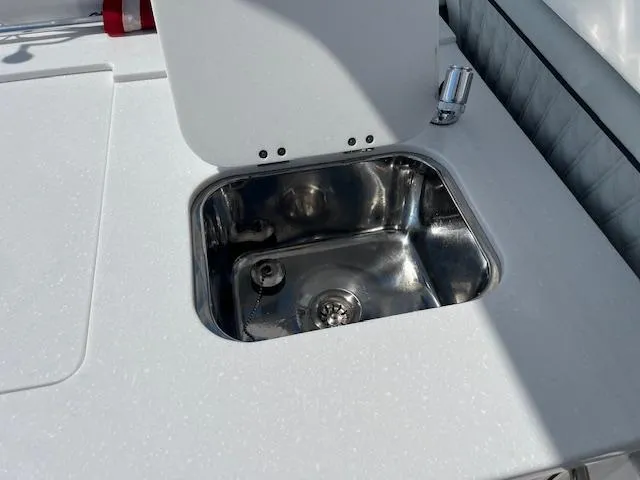 Slide: The Image of 2024 Blackfin 302 DC boat interior with adjustable seating and sleek design. - 26