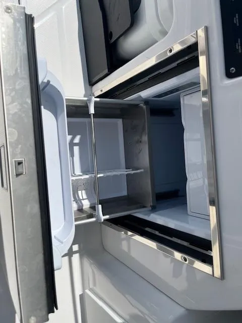 Slide: The Image of Stainless steel compartment on 2024 Blackfin 302 DC boat. - 29