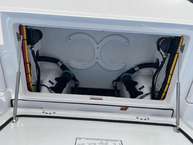 Slide: The Image of 2024 Blackfin 302 DC boat with dual Mercury outboard engines on water. - 4