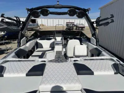 Slide: The Image of 2024 Tigé 22RZX boat interior with luxury seating and advanced audio system. - 8