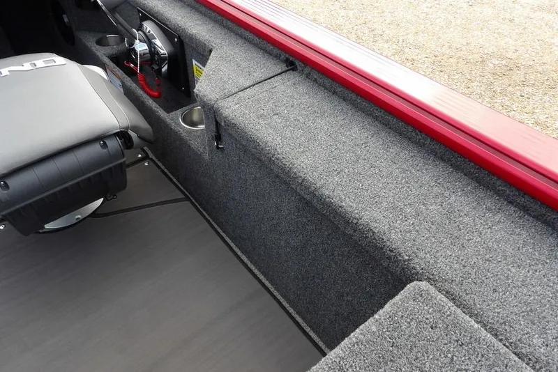Slide: The Image of 2025 Lund 2075 Pro-V Bass XS interior with gray seating and red trim. - 23