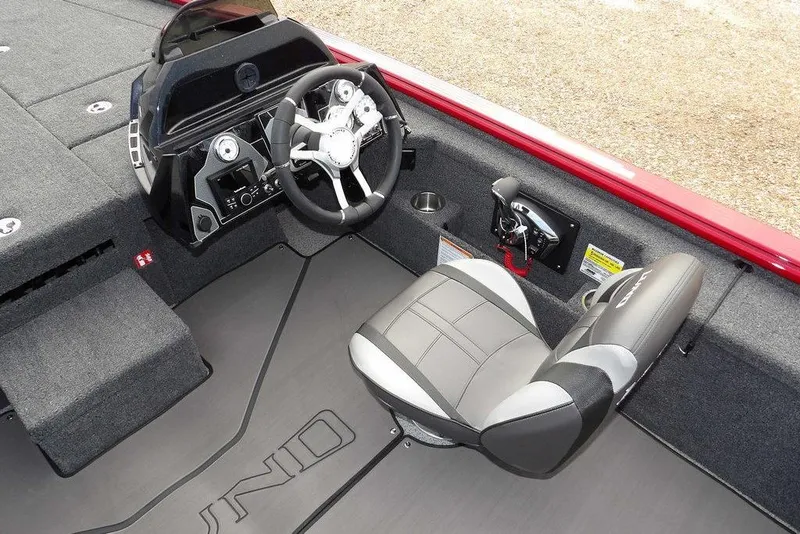 Slide: The Image of 2025 Lund 2075 Pro-V Bass XS boat interior with steering wheel and seat. - 26