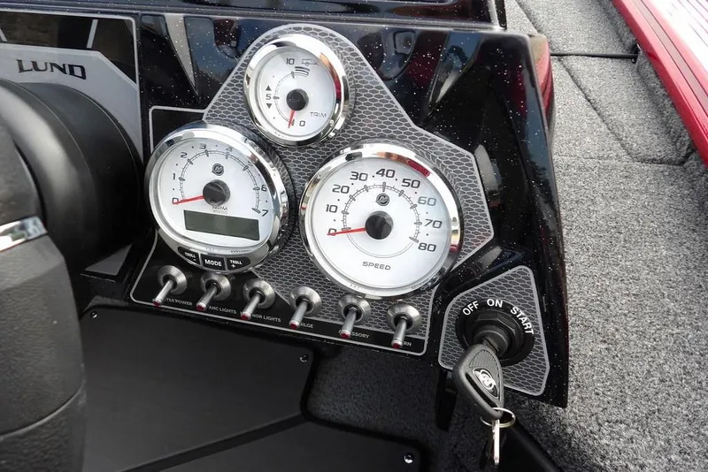 Slide: The Image of Dashboard of 2025 Lund 2075 Pro-V Bass XS boat with gauges and controls. - 28