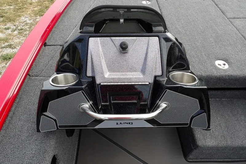 Slide: The Image of 2025 Lund 2075 Pro-V Bass XS boat console with cup holders and sleek design. - 33