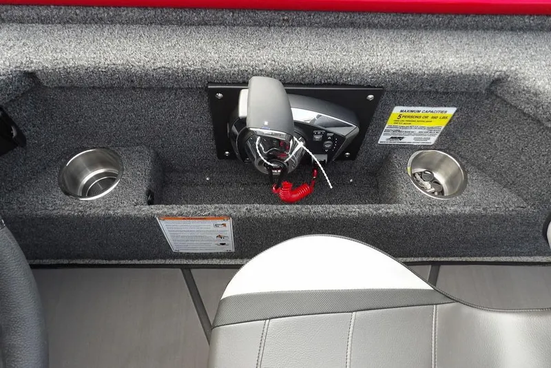 Slide: The Image of 2025 Lund 2075 Pro-V Bass XS boat console with cup holders and controls. - 35