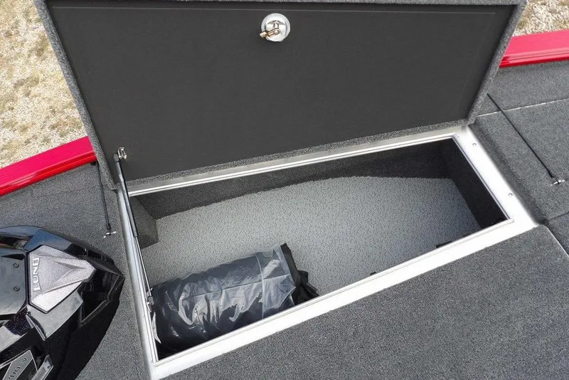 Slide: The Image of Open storage compartment in 2025 Lund 2075 Pro-V Bass XS boat. - 49
