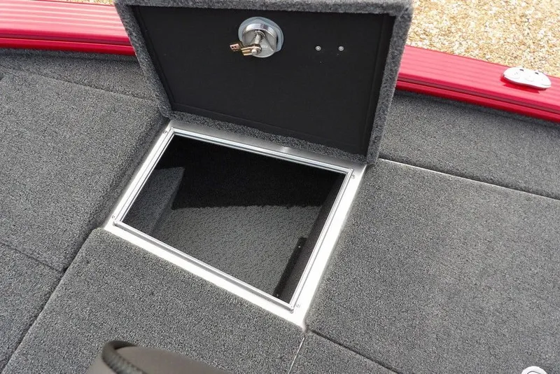Slide: The Image of Open storage compartment on 2025 Lund 2075 Pro-V Bass XS boat deck. - 50