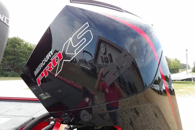 Slide: The Image of Mercury Pro XS engine on 2025 Lund 2075 Pro-V Bass XS boat, reflecting surroundings. - 60