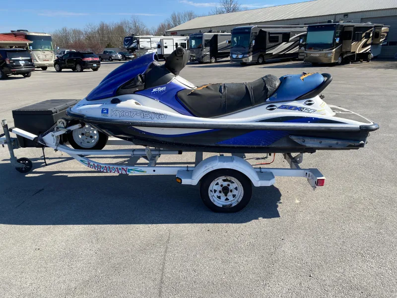 Slide: The Image of 2007 Kawasaki STX-12F jet ski on trailer in parking lot. - 10