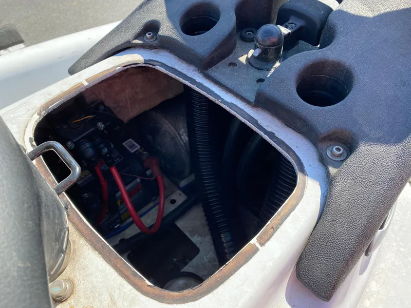 Slide: The Image of 2007 Kawasaki STX-12F jet ski with open storage compartment, showing internal wiring. - 15