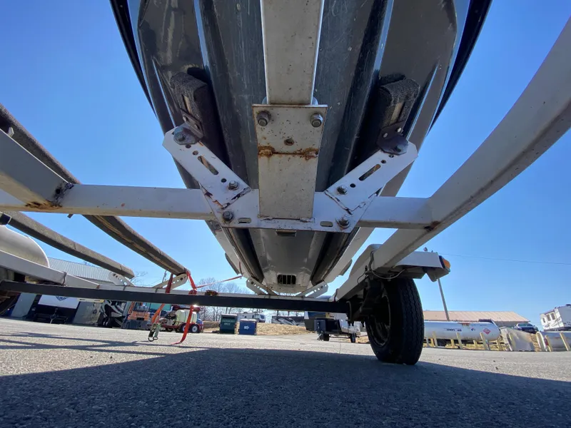 Slide: The Image of Underneath view of a 2007 Kawasaki STX-12F jet ski on a trailer. - 28