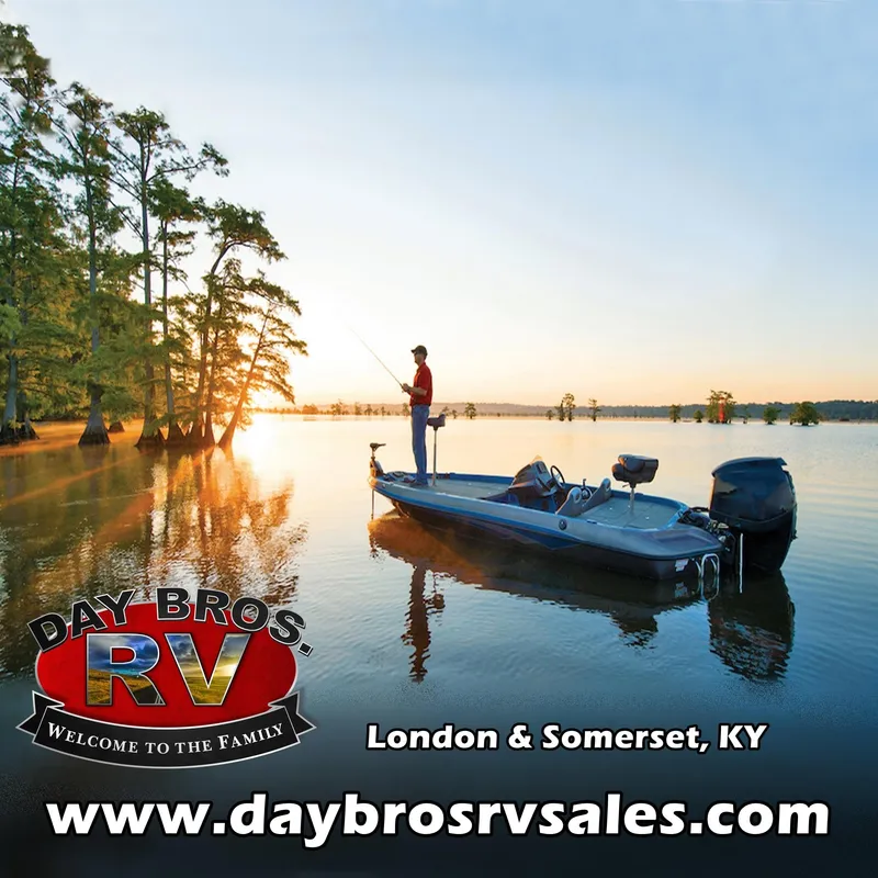 Slide: The Image of Man fishing on a boat at sunrise, Day Bros RV logo, London & Somerset, KY. - 30