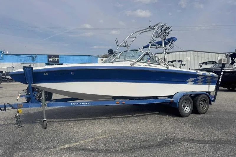 Slide: The Image of 2025 Lund 2075 Pro-V Bass XS boat interior with seating and storage compartments. - 12