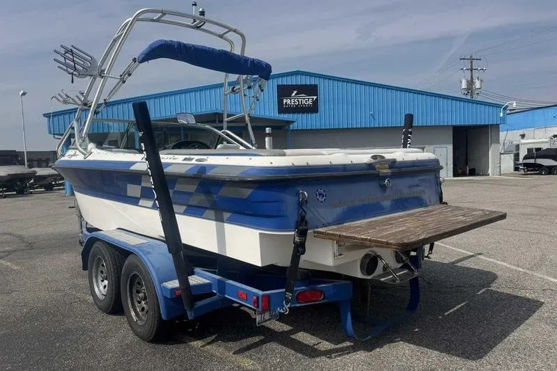 Slide: The Image of 2025 Lund 2075 Pro-V Bass XS boat interior with steering wheel and seat. - 21