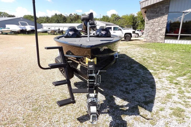 Slide: The Image of Interior view of 2025 Lund 2075 Pro-V Bass XS boat, featuring speaker and wiring. - 27