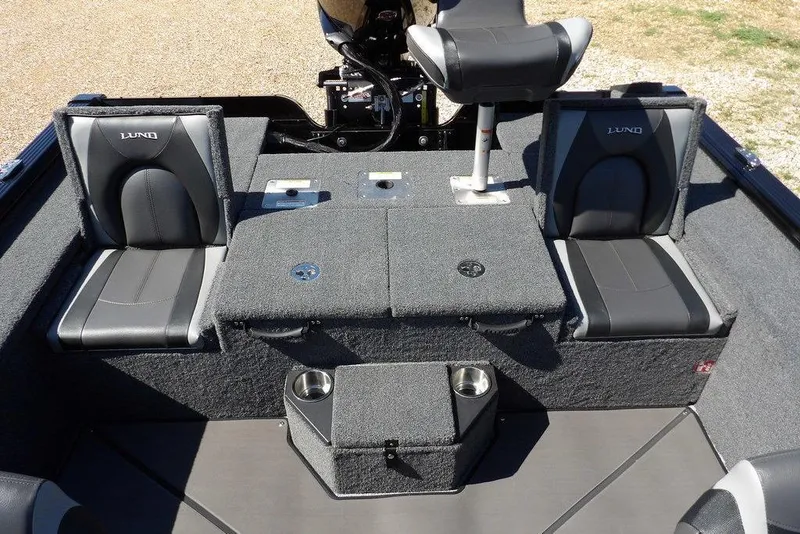 Slide: The Image of 2025 Lund 2075 Pro-V Bass XS storage compartment with white lid. - 36