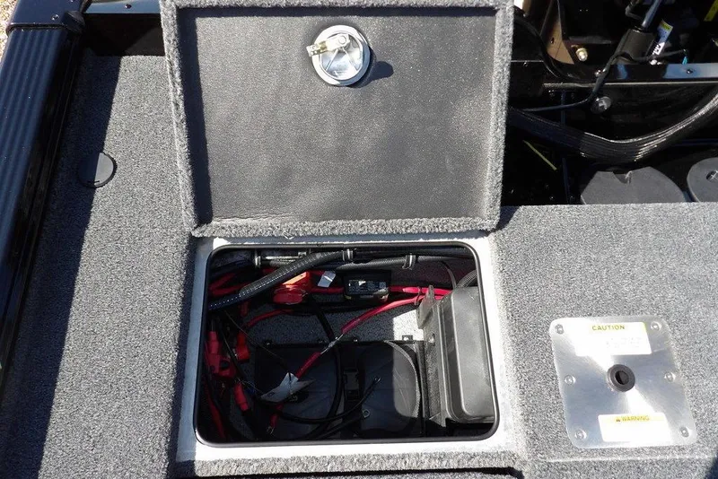 Slide: The Image of Open storage compartment on 2025 Lund 2075 Pro-V Bass XS boat. - 40