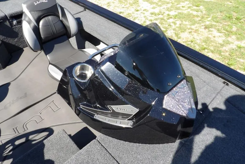 Slide: The Image of 2025 Lund 2075 Pro-V Bass XS boat interior with sleek console and comfortable seating. - 42