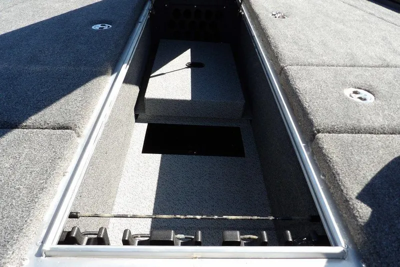 Slide: The Image of 2025 Lund 2075 Pro-V Bass XS boat interior storage compartment. - 43