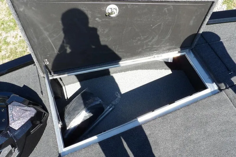 Slide: The Image of Open storage compartment in 2025 Lund 2075 Pro-V Bass XS boat. - 44