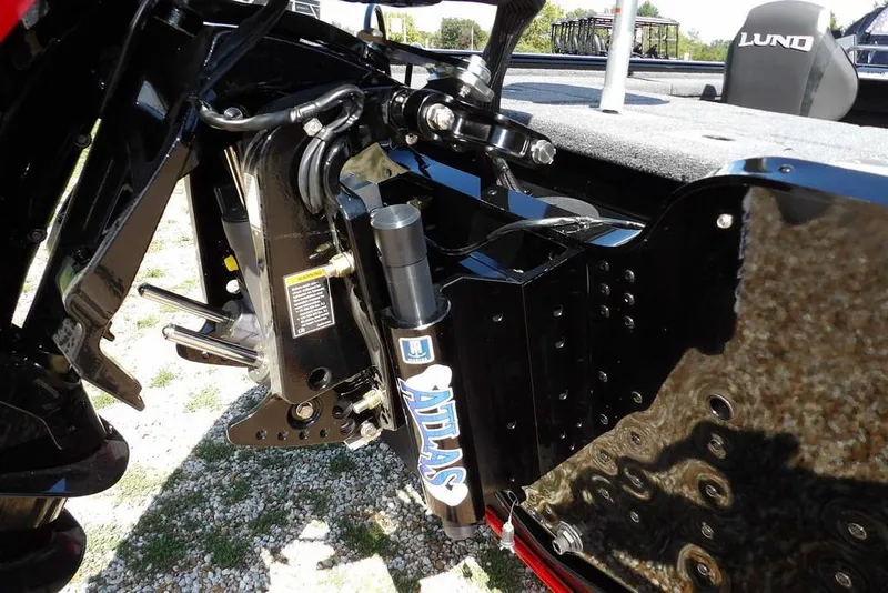 Slide: The Image of 2025 Lund 2075 Pro-V Bass XS boat engine mount detail with Atlas hydraulic jack plate. - 54