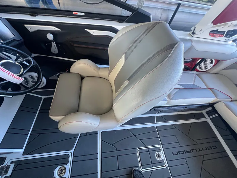 Slide: The Image of 2022 Centurion Ri230 interior with gray seating and modern dashboard design. - 12