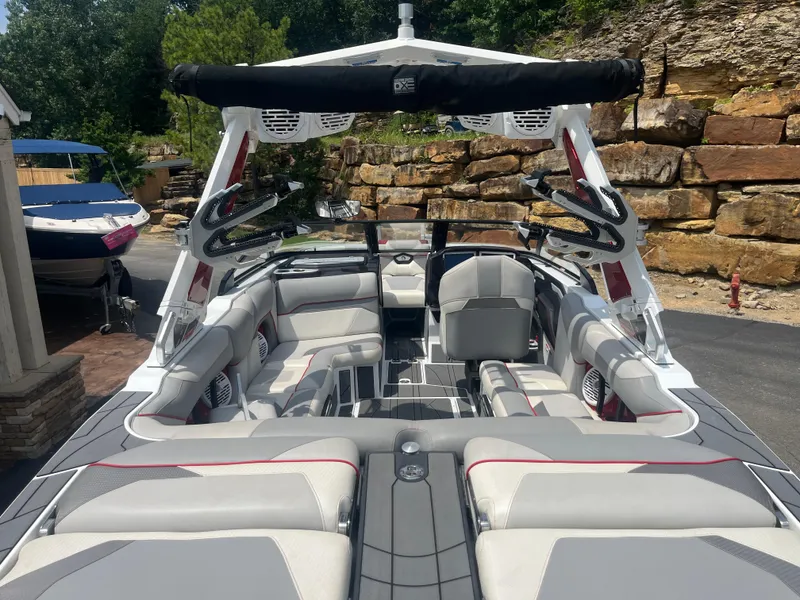 Slide: The Image of 2022 Centurion Ri230 boat interior with luxurious seating and modern design. - 27