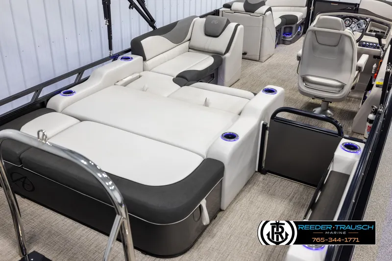 Slide: The Image of 2021 Avalon LSZ VRB pontoon boat interior with luxurious seating and modern design. - 11