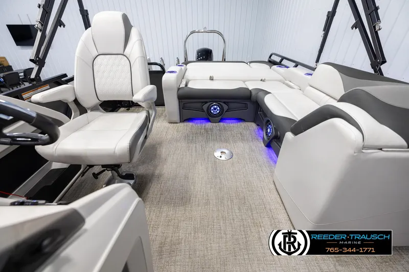 Slide: The Image of Interior of 2021 Avalon LSZ VRB boat with luxurious seating and ambient lighting. - 13