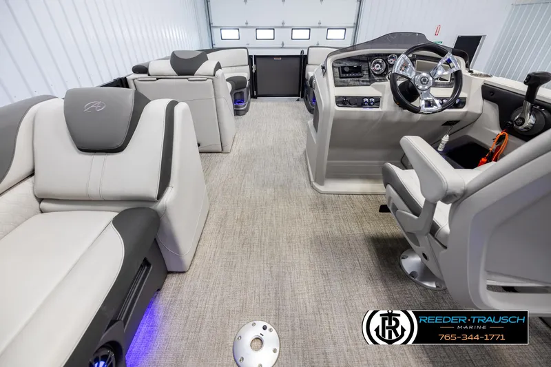 Slide: The Image of 2021 Avalon LSZ VRB boat interior with modern seating and steering console. - 16