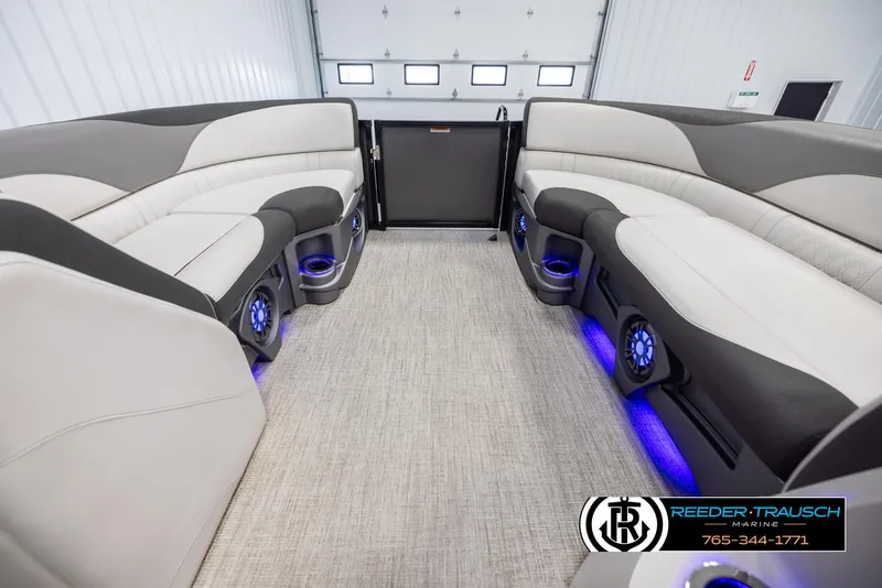 Slide: The Image of 2021 Avalon LSZ VRB interior with plush seating and blue LED lighting. - 17