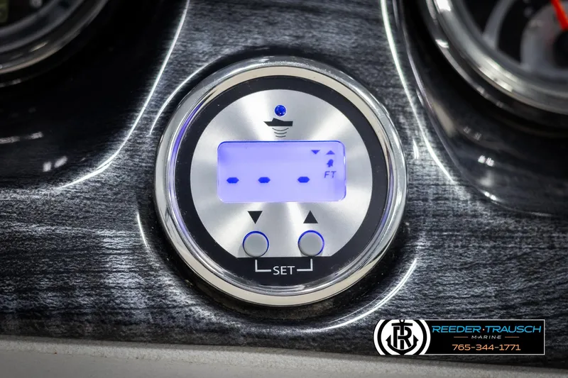 Slide: The Image of Digital control panel on 2021 Avalon LSZ VRB boat dashboard, featuring blue LED display. - 32