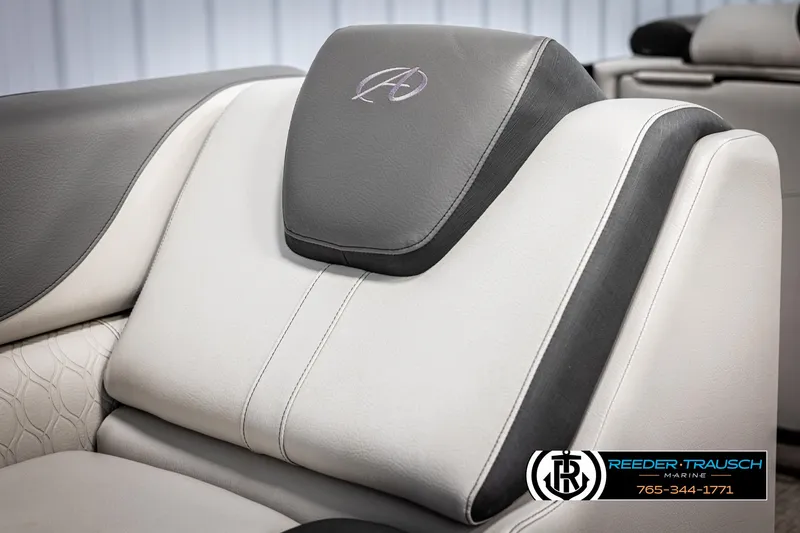 Slide: The Image of 2021 Avalon LSZ VRB boat seat with logo, featuring gray and white upholstery. - 38