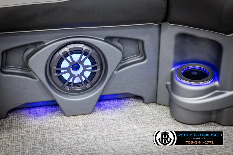 Slide: The Image of 2021 Avalon LSZ VRB interior with illuminated speaker and cup holder, featuring blue LED lighting. - 39