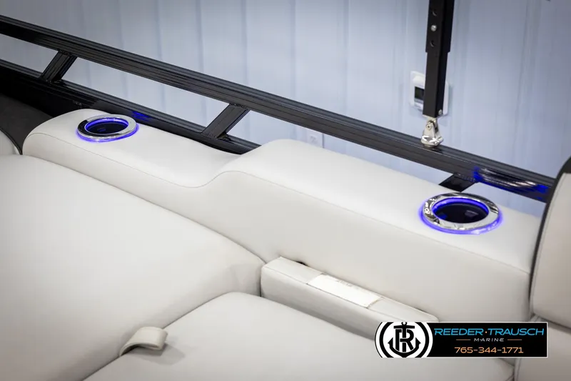 Slide: The Image of 2021 Avalon LSZ VRB boat interior with illuminated cup holders and sleek seating design. - 42