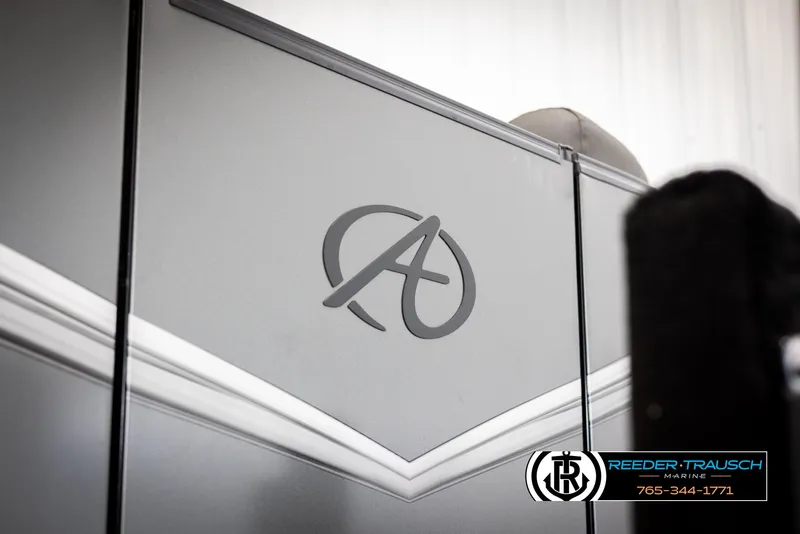 Slide: The Image of 2021 Avalon LSZ VRB boat with logo, featuring sleek gray design and branding details. - 47