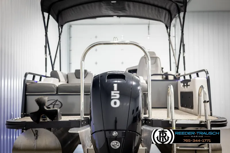 Slide: The Image of 2021 Avalon LSZ VRB pontoon boat with 150 horsepower engine in showroom. - 6